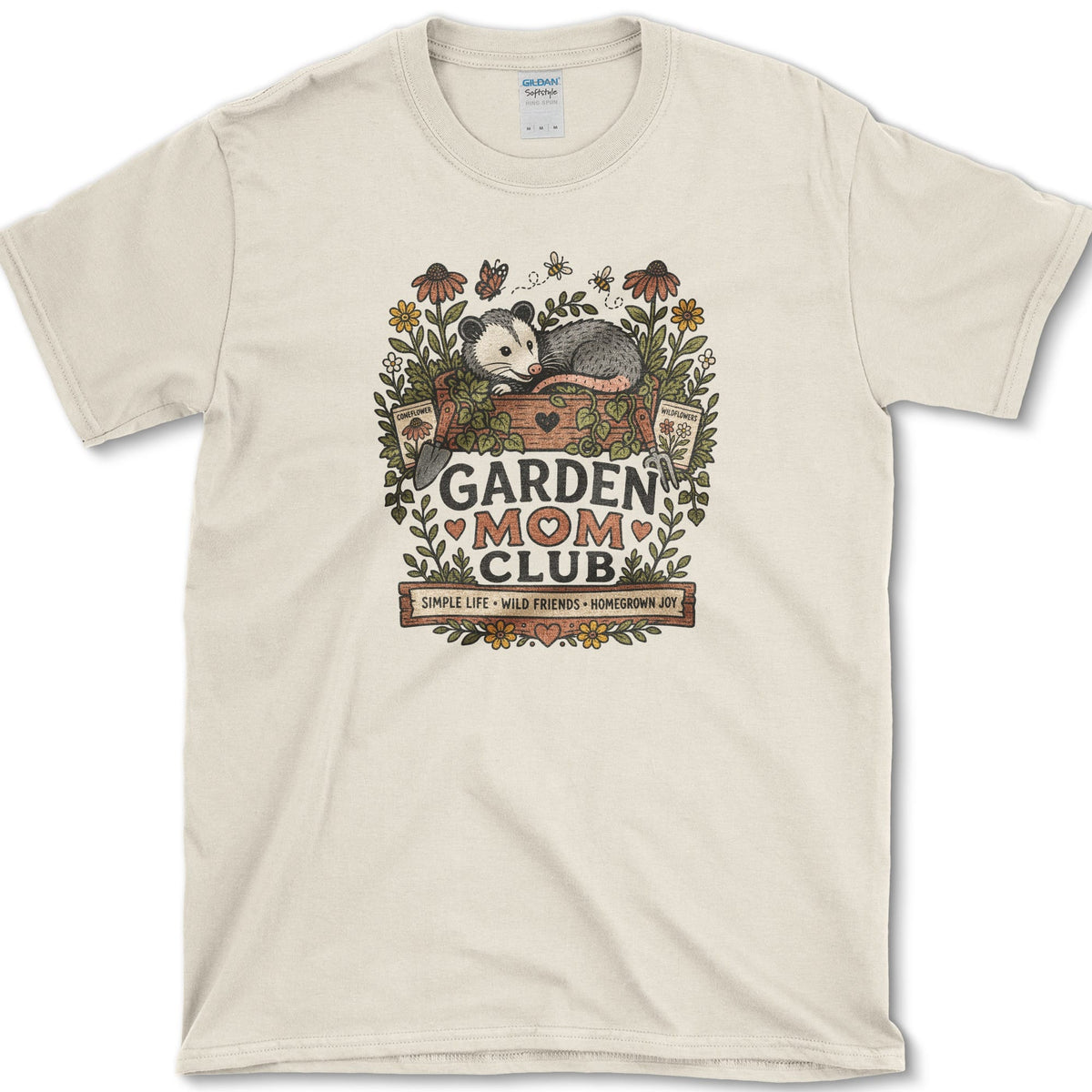 Opossum resting in a painted garden planter surrounded by coneflowers, bees, butterflies, and Garden Mom Club lettering