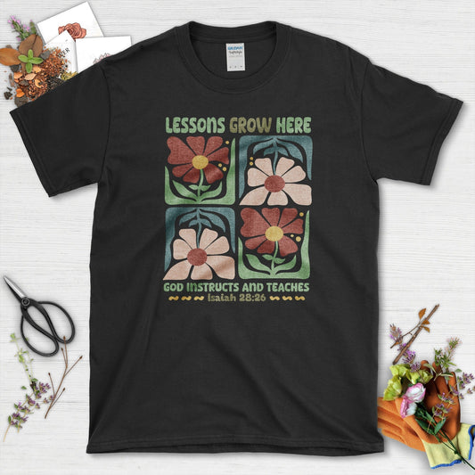 Lessons Grow Here T-Shirt Essential Tees / S / Black Physical Item