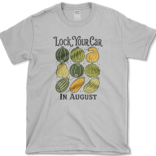 Nine colorful summer squash beneath Lock Your Car in August lettering on a T-shirt