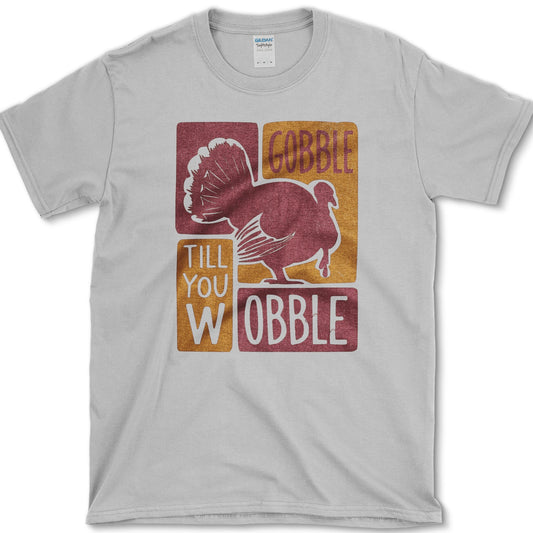 Gobble Till You Wobble artwork featuring turkey and Thanksgiving turkey on a T-shirt