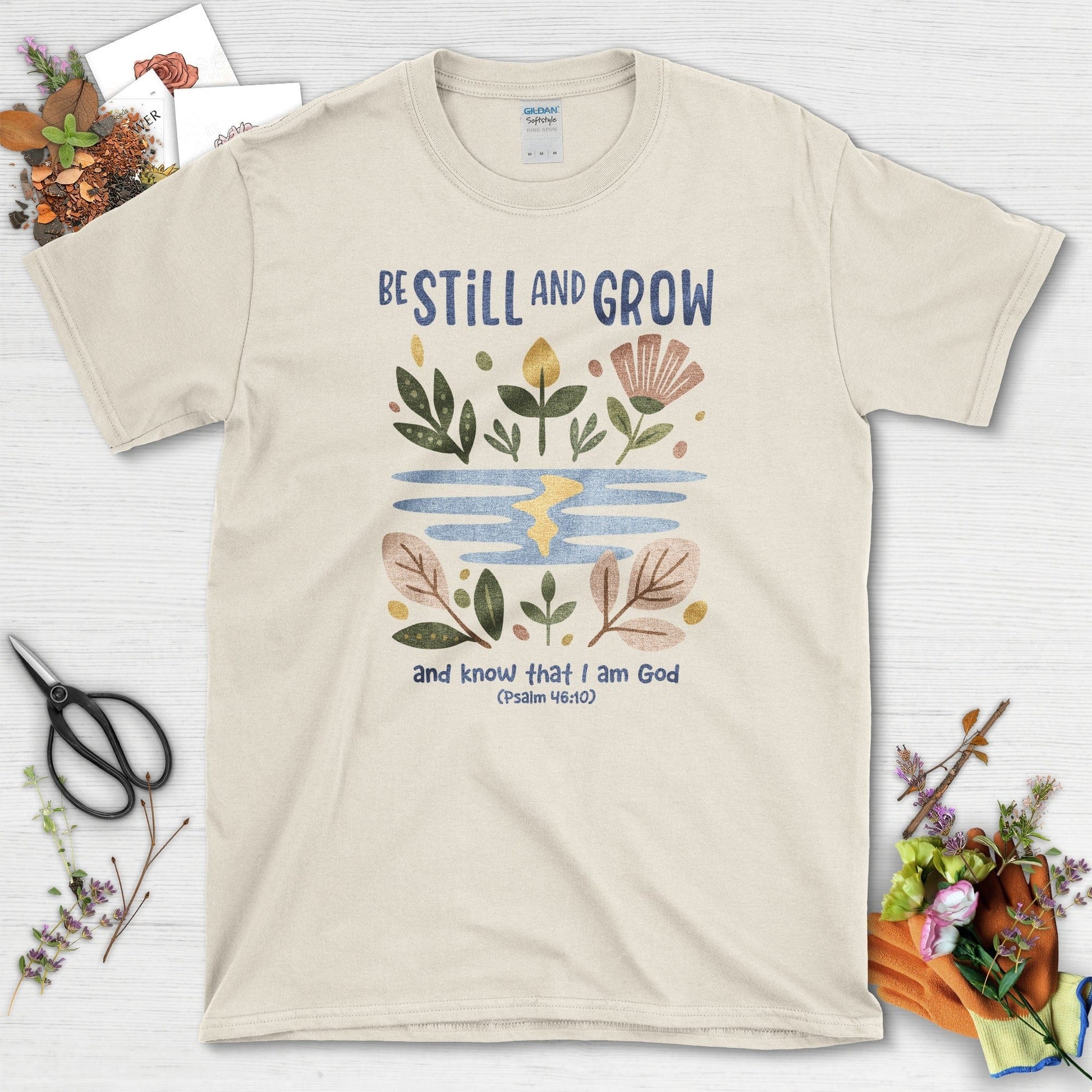 Be Still and Grow T-Shirt Essential Tees / S / Natural Physical Item