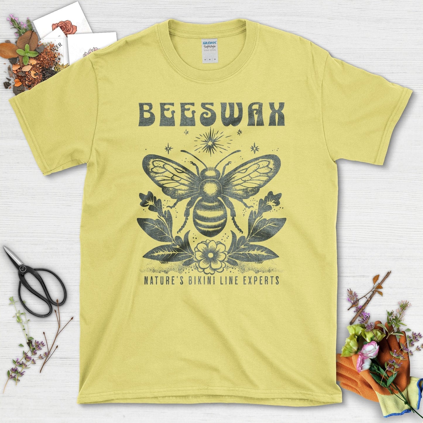 Beeswax Nature's Bikini Line Experts T-Shirts Cornsilk / S T-Shirt