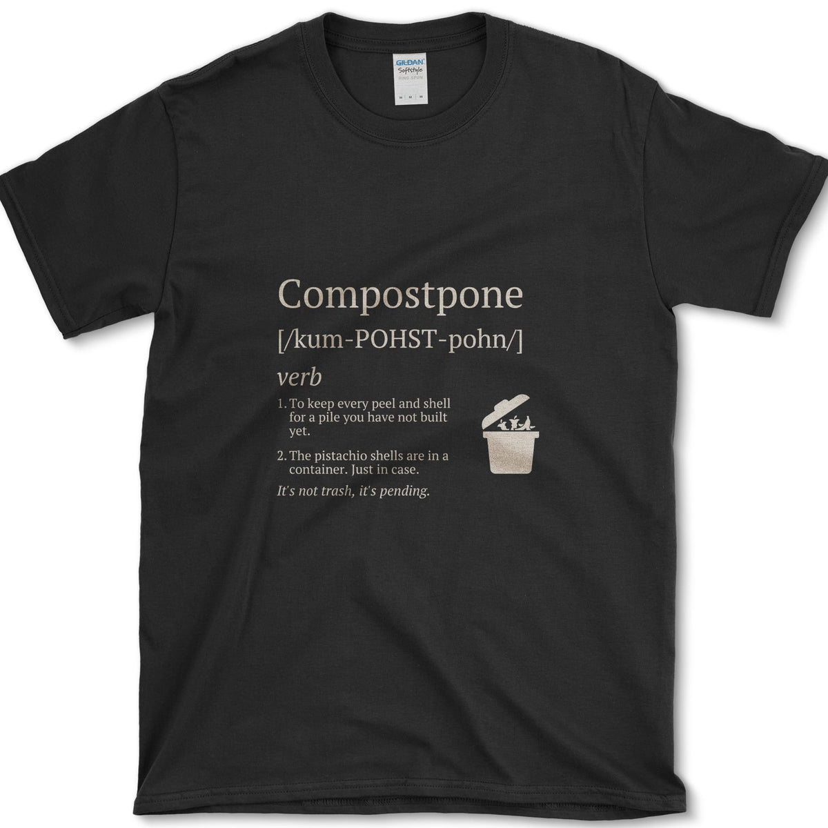 Cream Compostpone mock dictionary entry with a small kitchen-scrap bin and hand illustration on a T-shirt