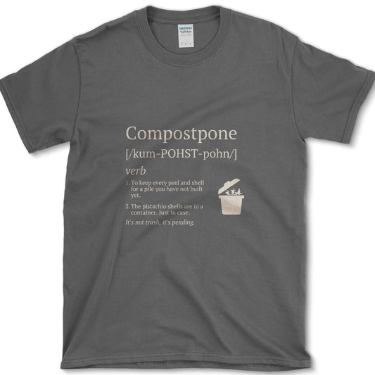 Cream Compostpone mock dictionary entry with a small kitchen-scrap bin and hand illustration on a T-shirt