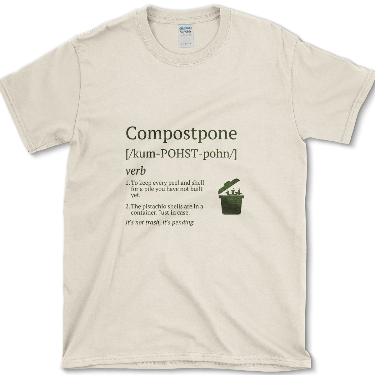 Cream Compostpone mock dictionary entry with a small kitchen-scrap bin and hand illustration on a T-shirt