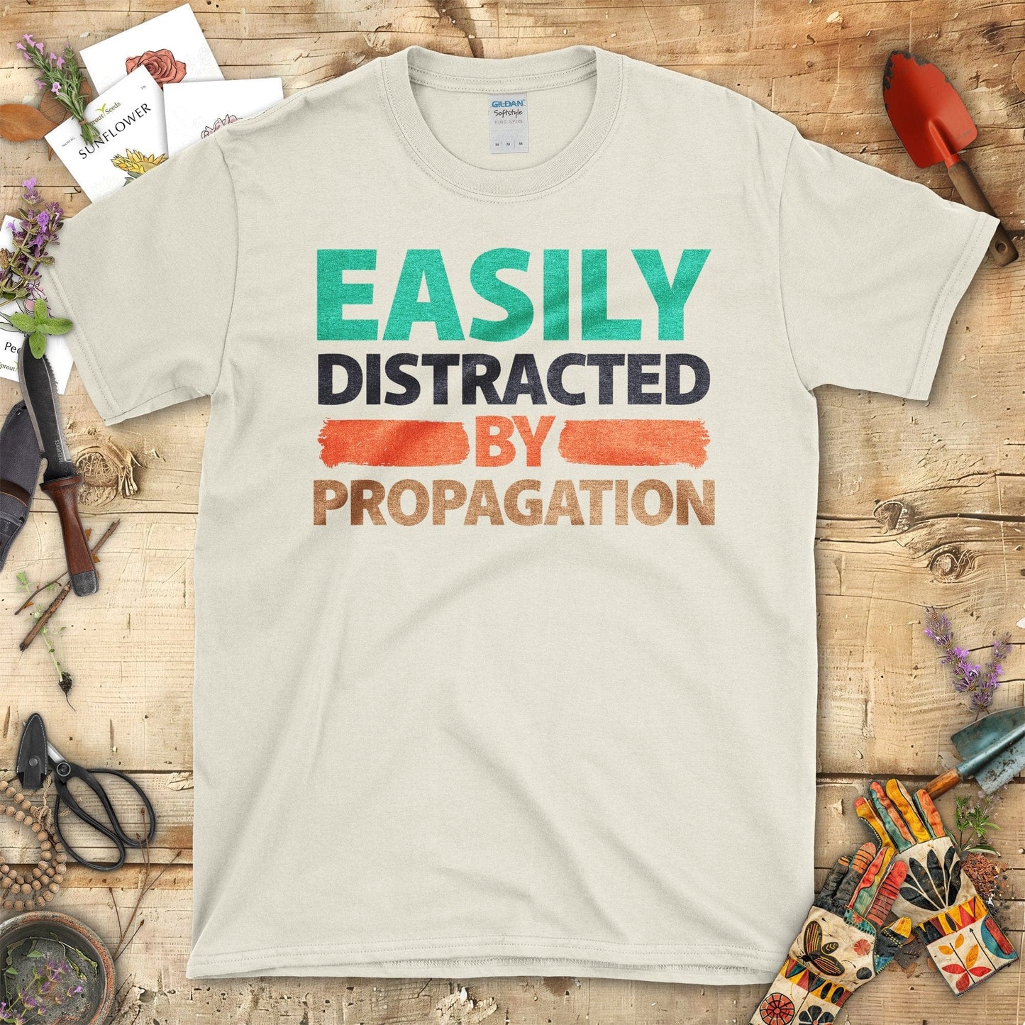 Easily Distracted By Propagation Graphic Print T-Shirt Natural / S T-Shirt