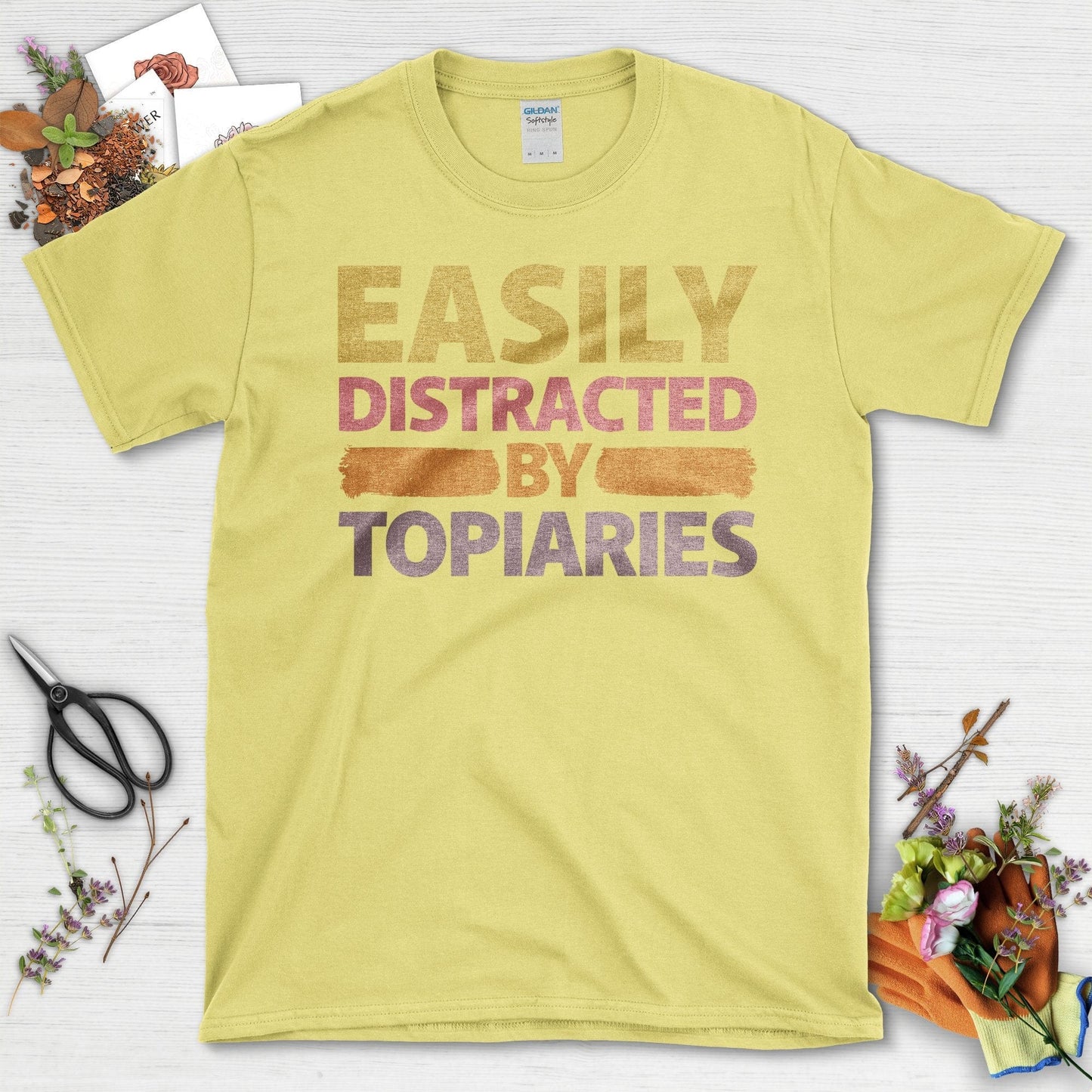 Easily Distracted by Topiaries Graphic Design T-Shirt Cornsilk / S T-Shirt