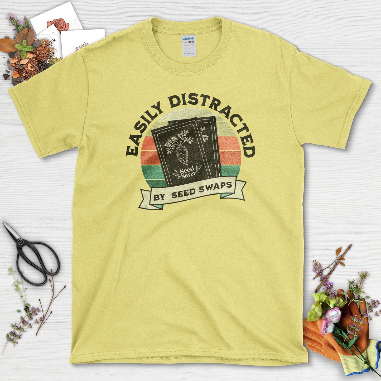 Easily Distracted Seed Swaps T-Shirt Cornsilk / S / T-Shirts Physical Item