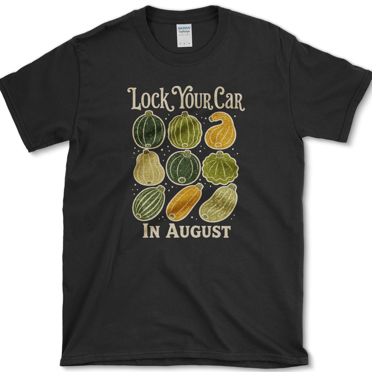 Nine colorful summer squash beneath Lock Your Car in August lettering on a T-shirt