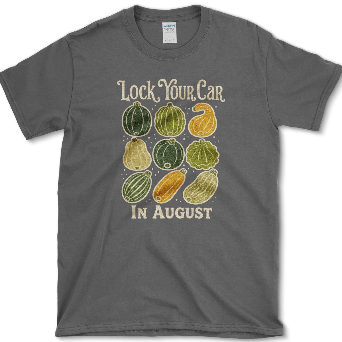 Nine colorful summer squash beneath Lock Your Car in August lettering on a T-shirt