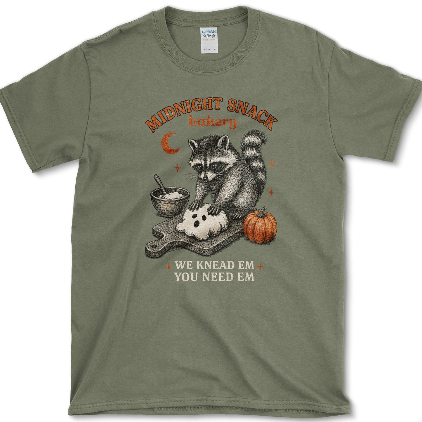 Midnight Snack Bakery artwork featuring baking raccoon and raccoon and pumpkin on a t-shirt