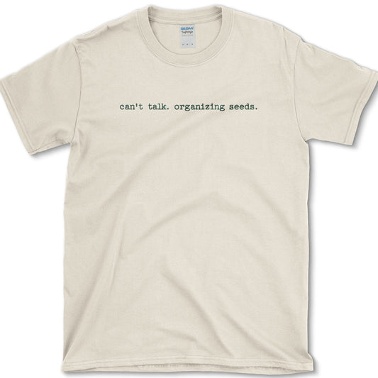 Organizing Seeds Quote T-Shirt Essential Tees / S / Natural Physical Item