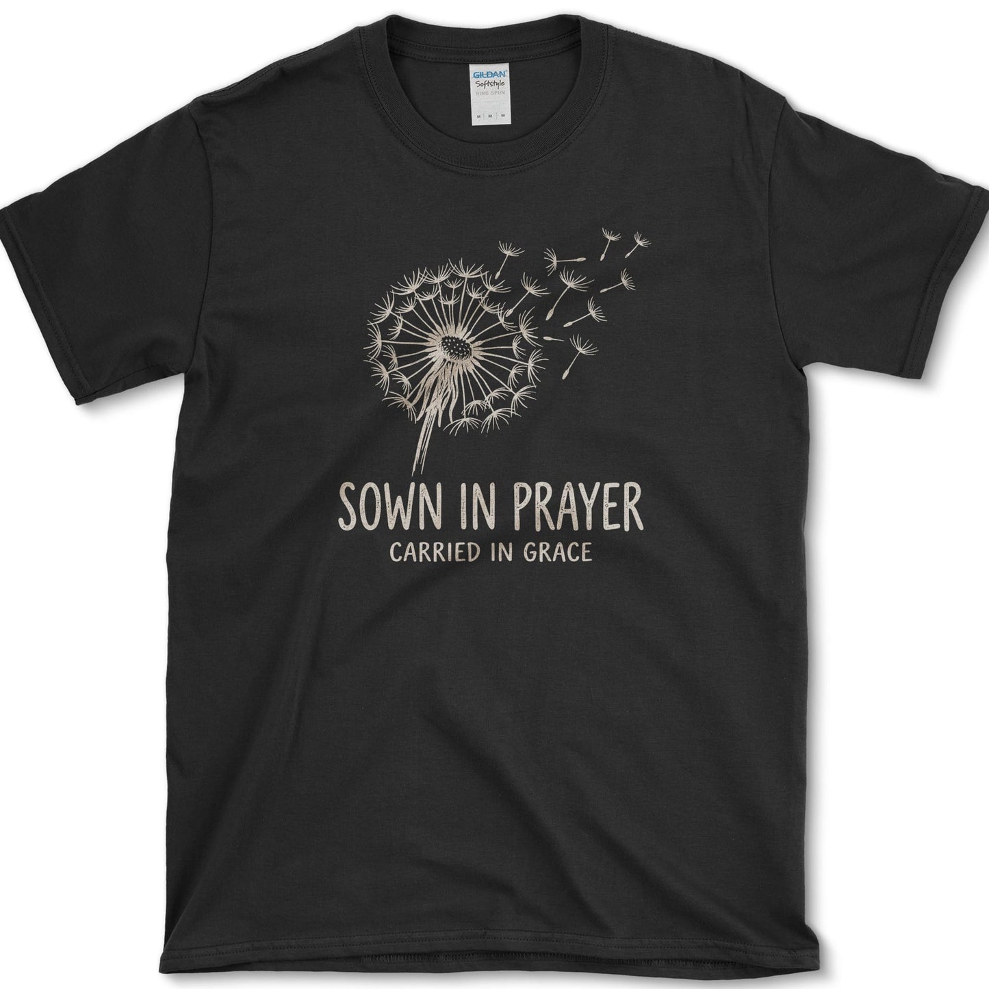 Sown in Prayer design featuring dandelion artwork on a t-shirt