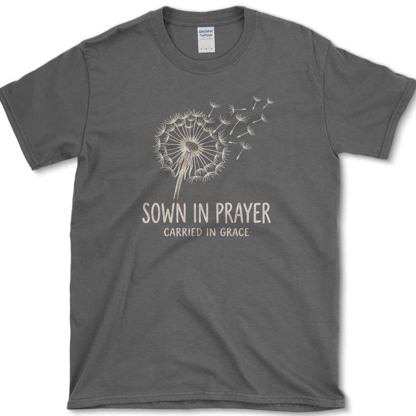 Sown in Prayer design featuring dandelion artwork on a t-shirt