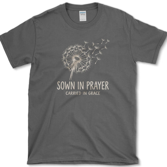 Sown in Prayer design featuring dandelion artwork on a t-shirt