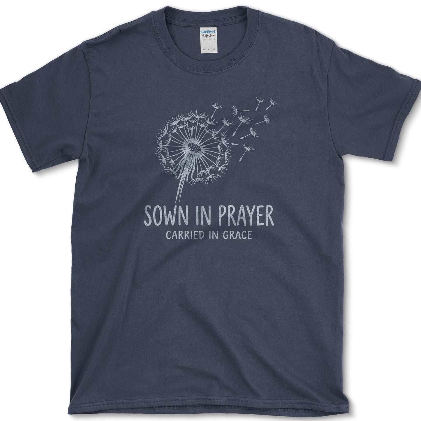 Sown in Prayer design featuring dandelion artwork on a t-shirt