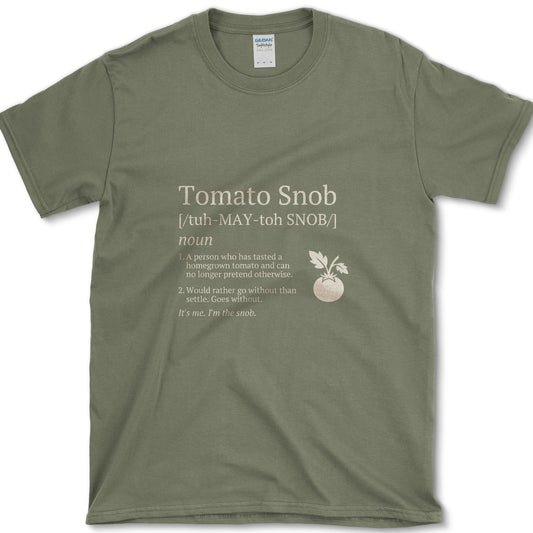 Cream Tomato Snob mock dictionary entry beside a ripe red tomato illustration on a T-shirt